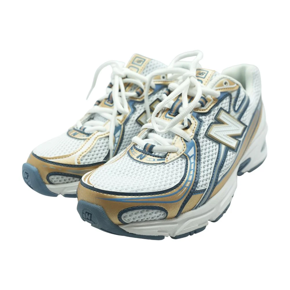 740 Gold Low Top Athletic Shoes